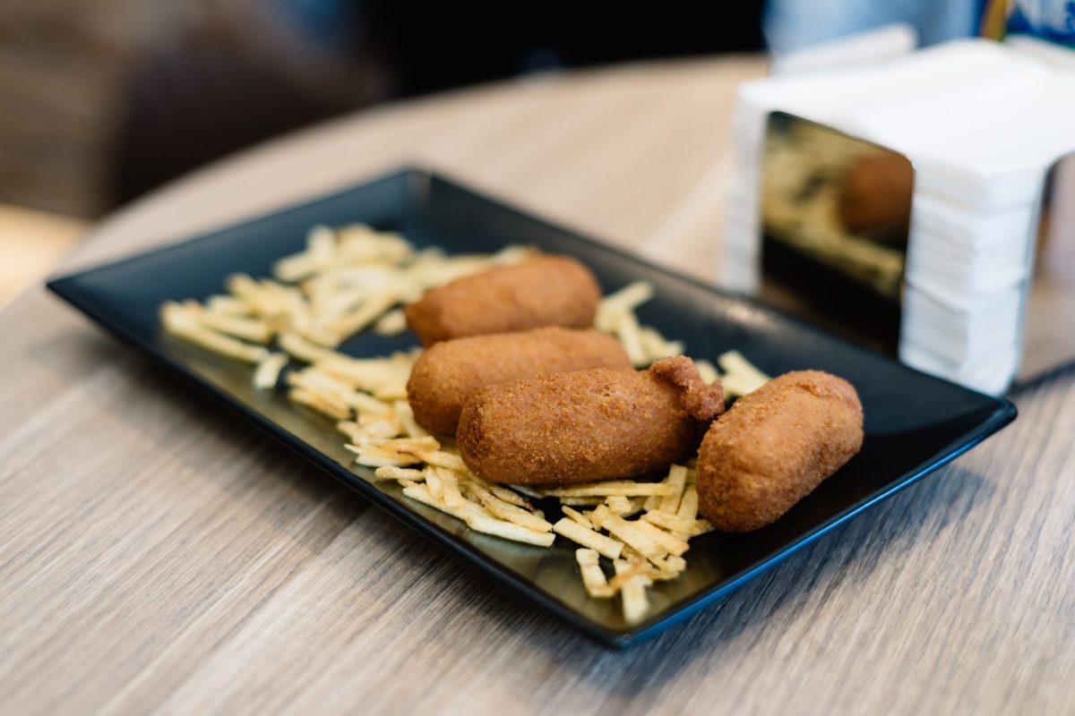 Close up of croquettes with potatoes. Focus on foreground
